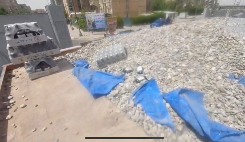 ضبط كمية كبيرة من المشروبات الكحولية مخبأة داخل شاحنة محملة بالحصى في بغداد