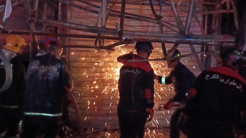 إخماد حريق اندلع داخل بناية تجارية بمنطقة المنصور في بغداد